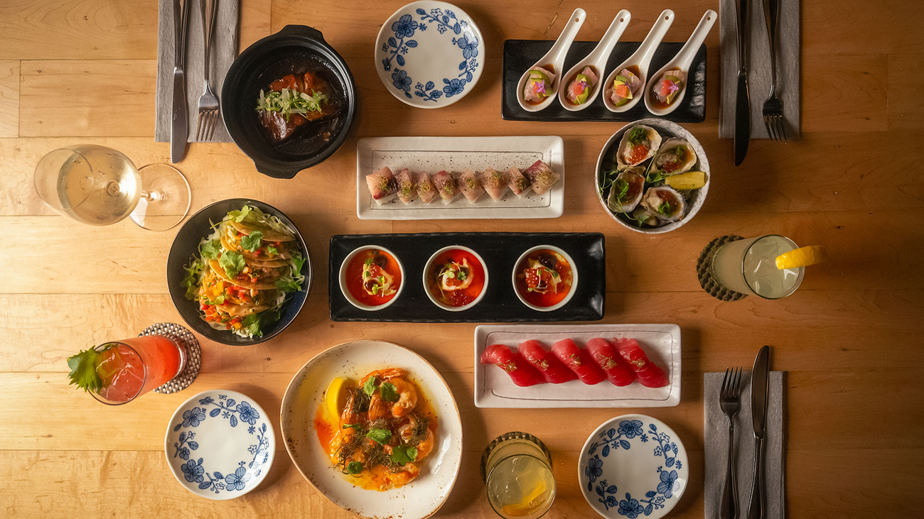 Bird eye view of a table spread of food and drinks