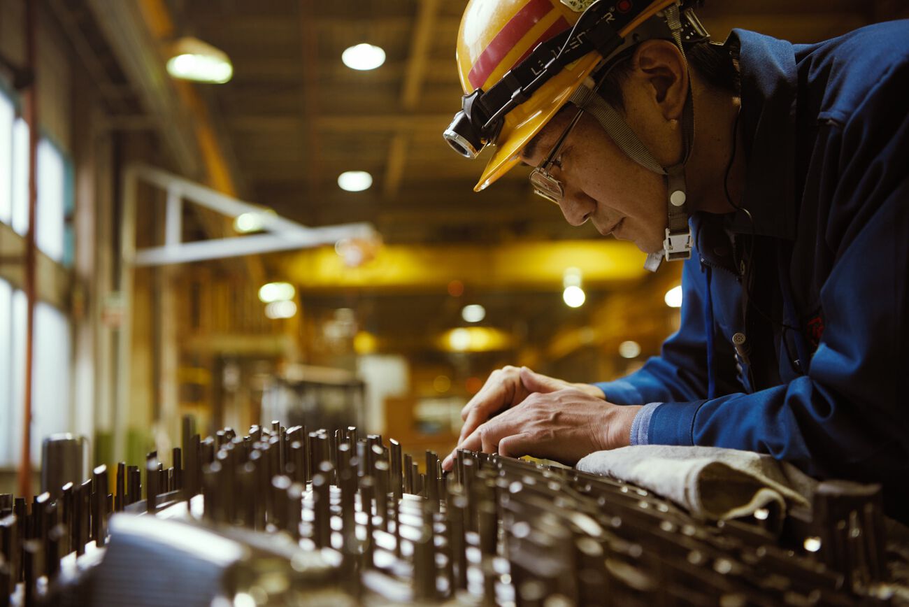 Man overseeing his mechanical tools.