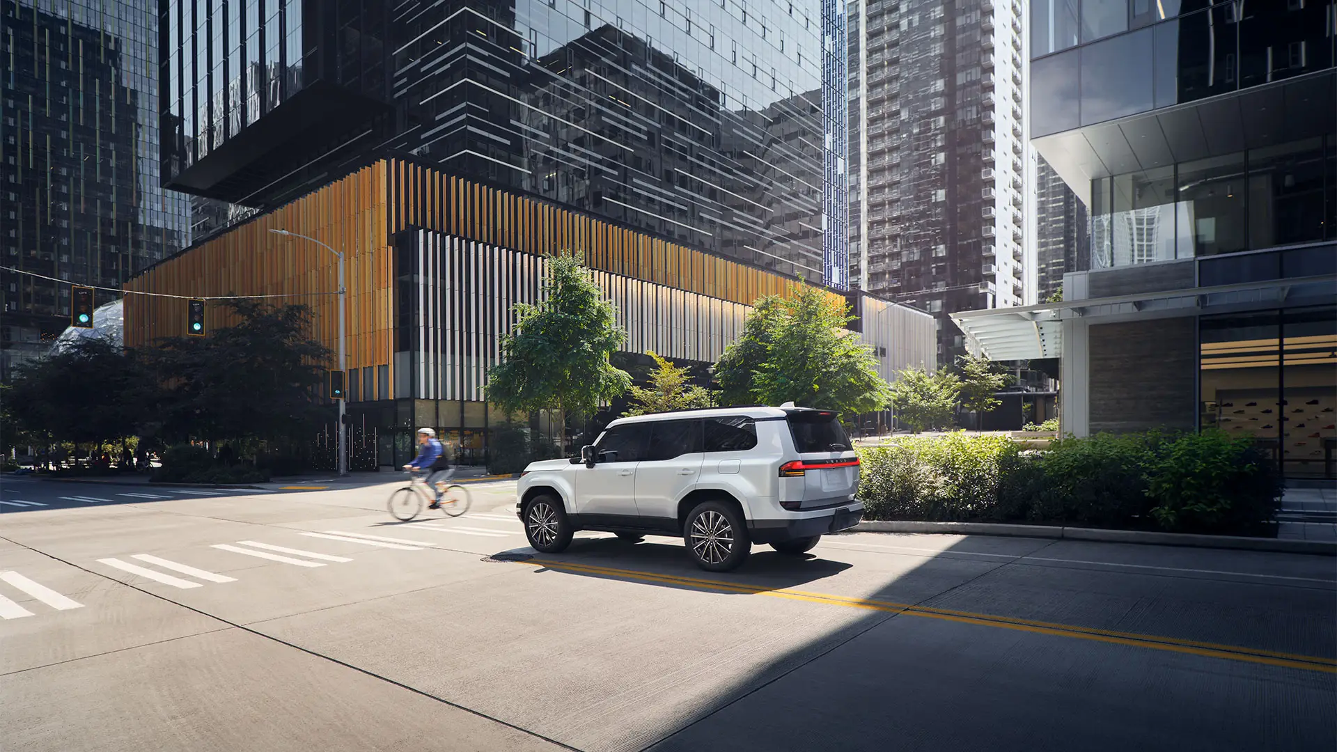 2025 GX 550 Luxury shown in Eminent White Pearl stopping before collision