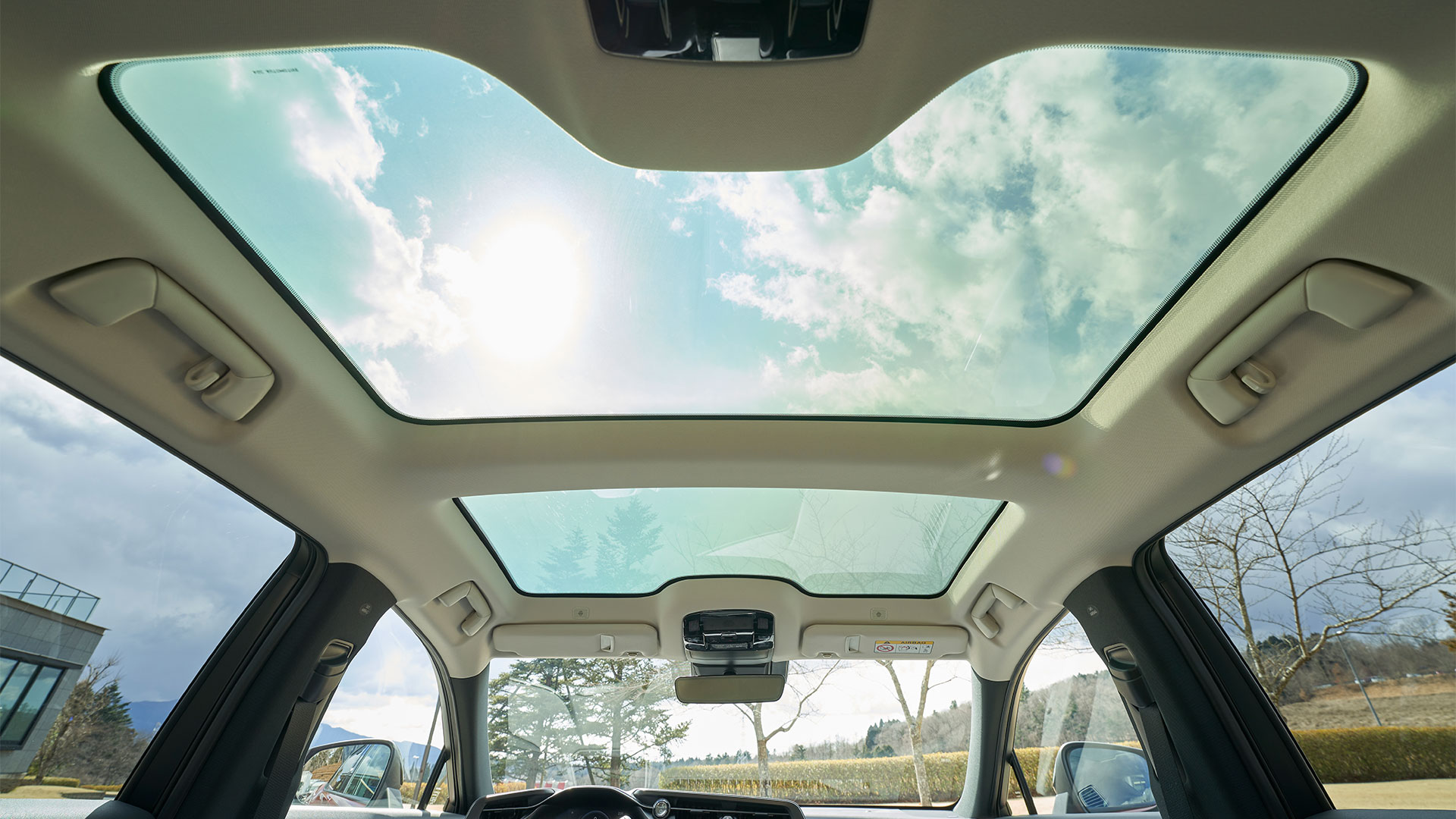 Showcasing front and rear seating panoramic roof