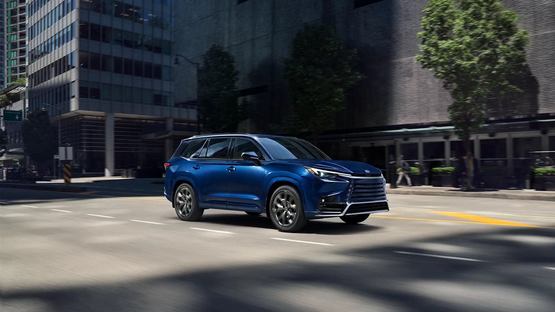 TX 500h F SPORT driving on road.