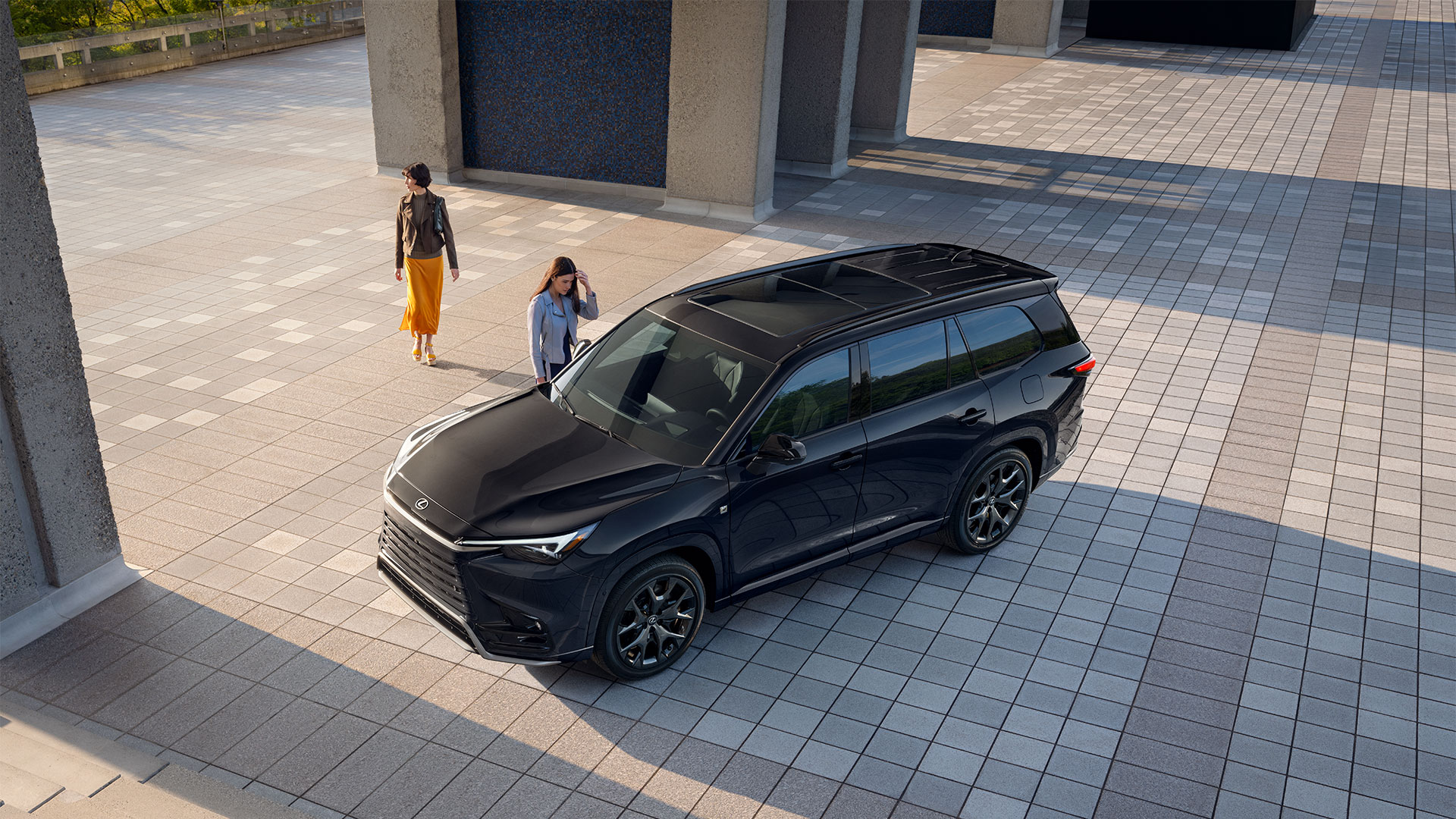 2025 Lexus TX 500 Hybrid Caviar parked